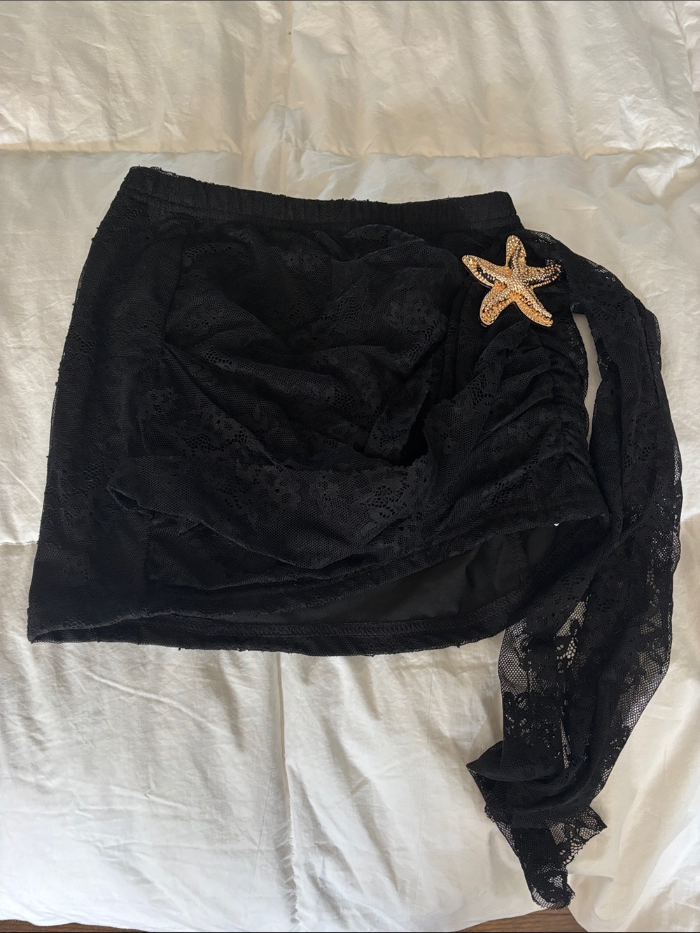 Black Lace Wrap Skirt with Gold Starfish Accent